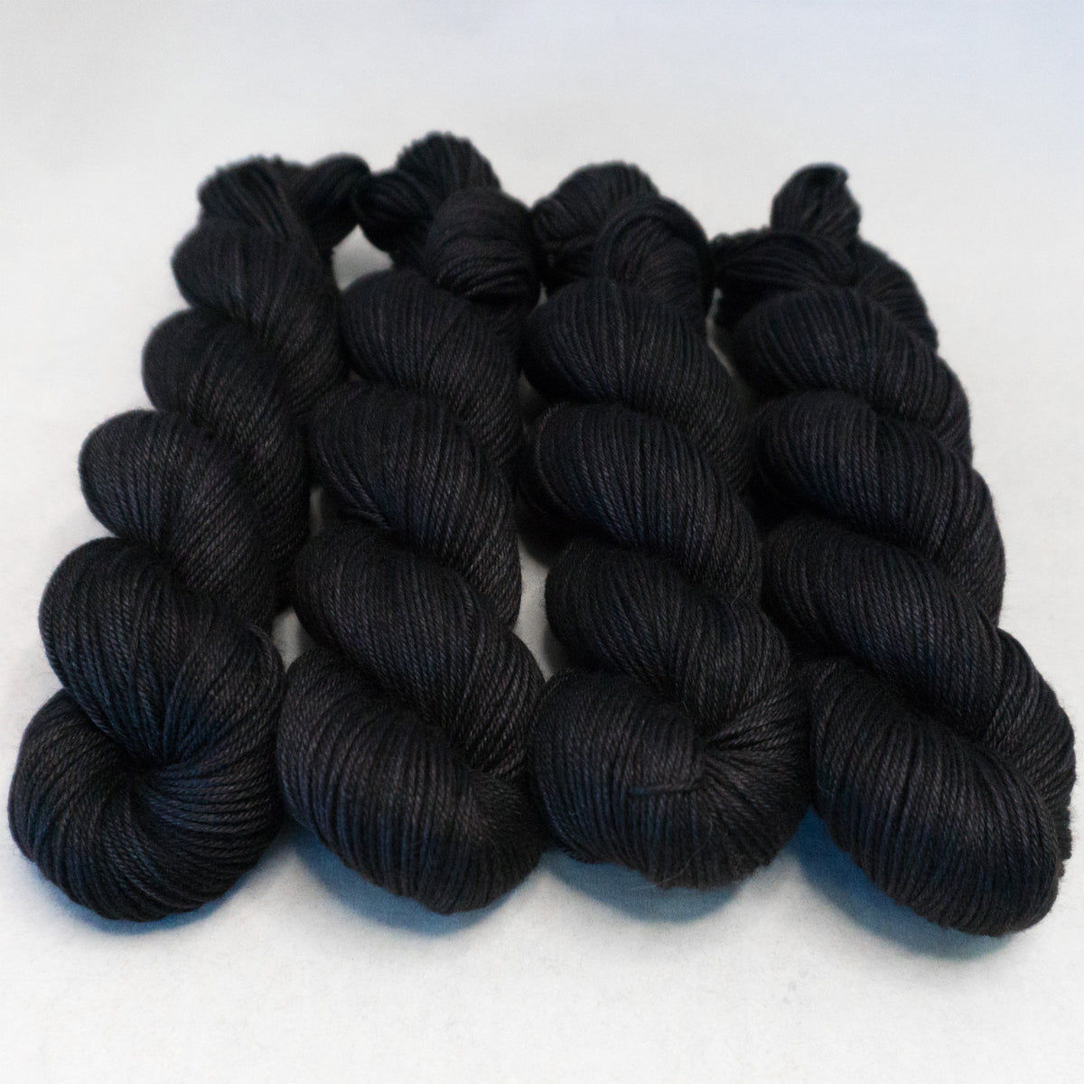 DK Yakity Yak Yarn - Black Semi Solid – Greenwood Fiberworks