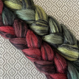 Polwarth Black Bamboo Silk Roving - Holly Berry